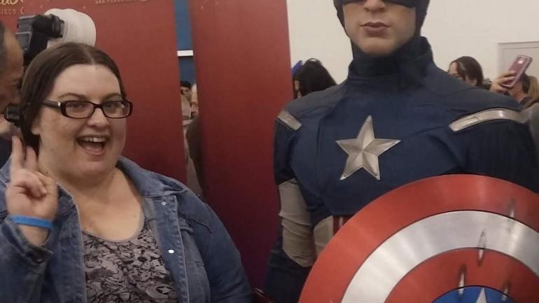 Danielle Smith poses with a wax figure of Captain America