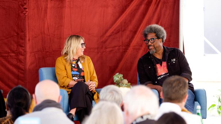 W. Kamau Bell and Kate Schatz on stage