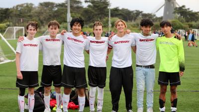 boys soccer team poses